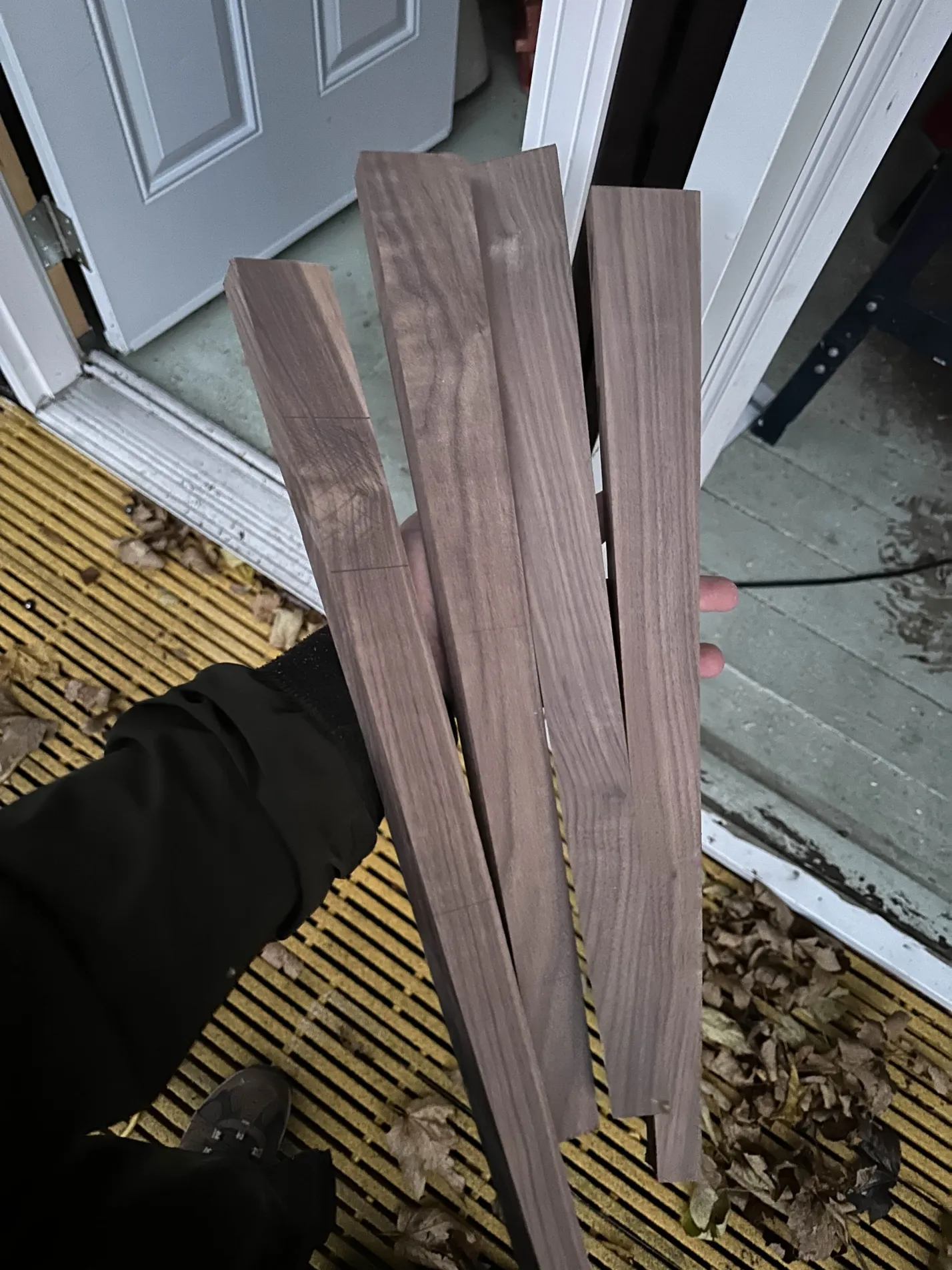 Four tapered walnut legs