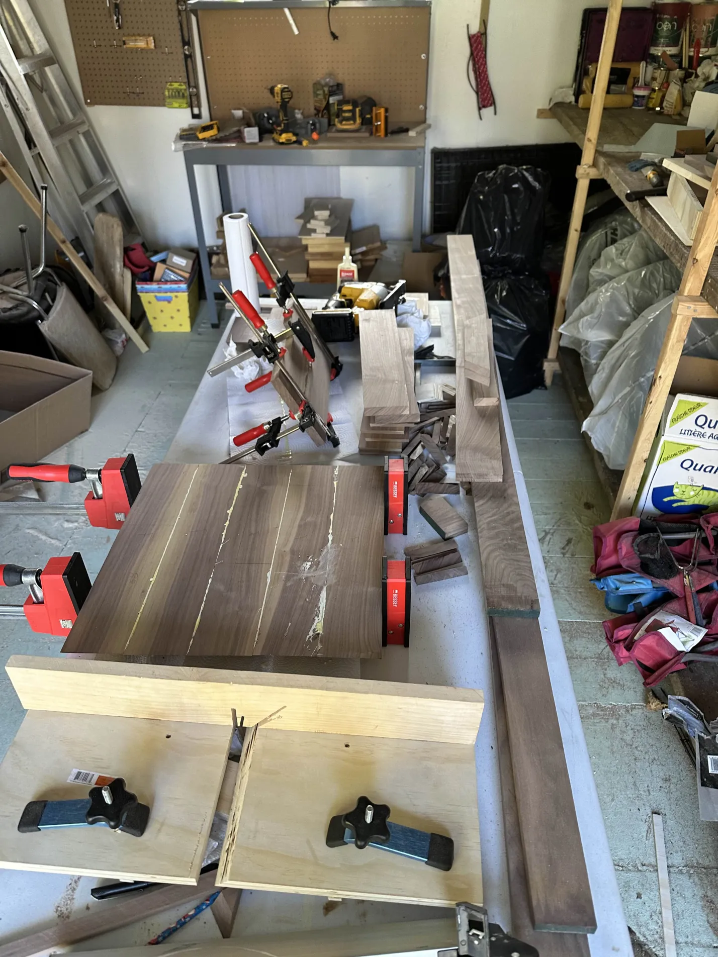 Walnut boards clamped with Bessey clamps